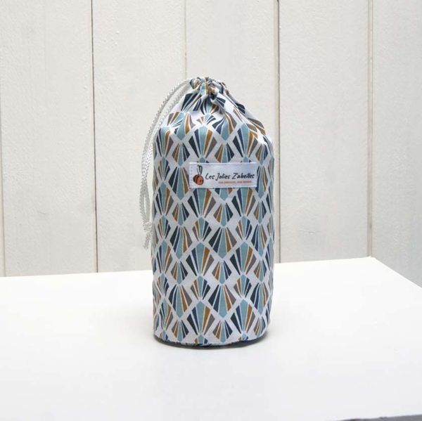 pochon et ses 20 disques à démaquiller lavables bleu multicolore motif géométrique