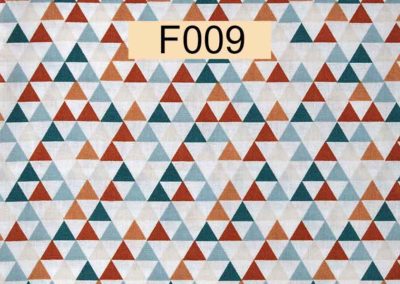 tissu coton triangles multicolores vert bleu rouille et ocre öeko tex référence F009